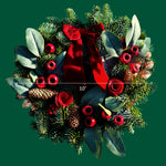 Red Rose and Rosehip Christmas Wreath Front view of the rose and rosehip Christmas wreath on a green background with a measurement line showing its 10-inch diameter. 3