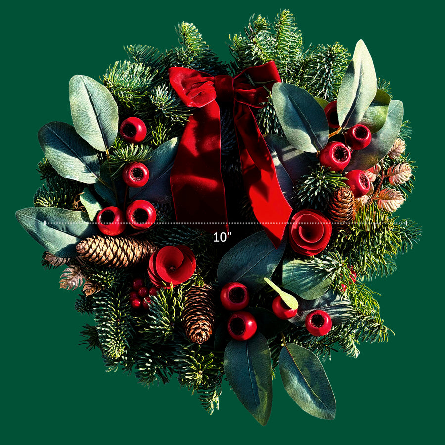 Red Rose and Rosehip Christmas Wreath Front view of the rose and rosehip Christmas wreath on a green background with a measurement line showing its 10-inch diameter. 3